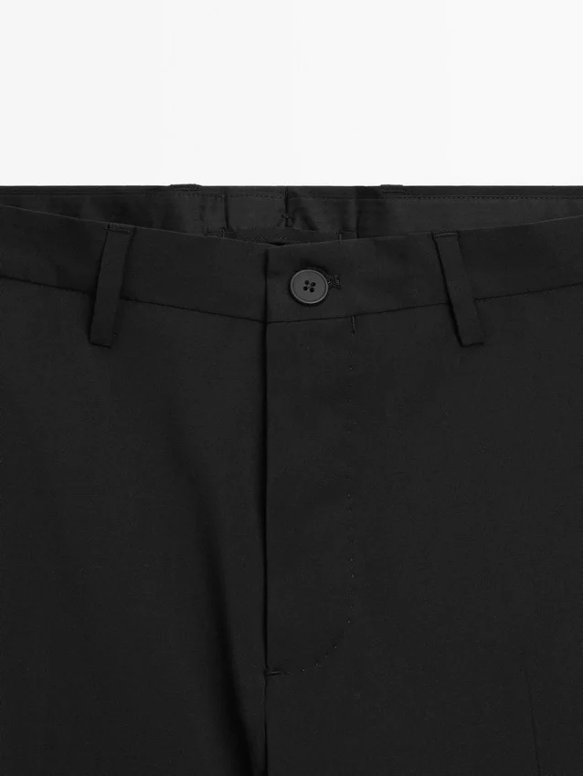 Enfärgade kostymbyxor i ull Enfärgade kostymbyxor i ull