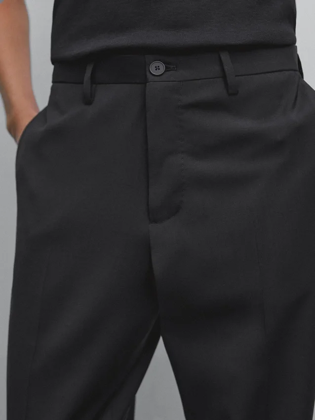 Enfärgade kostymbyxor i ull Enfärgade kostymbyxor i ull