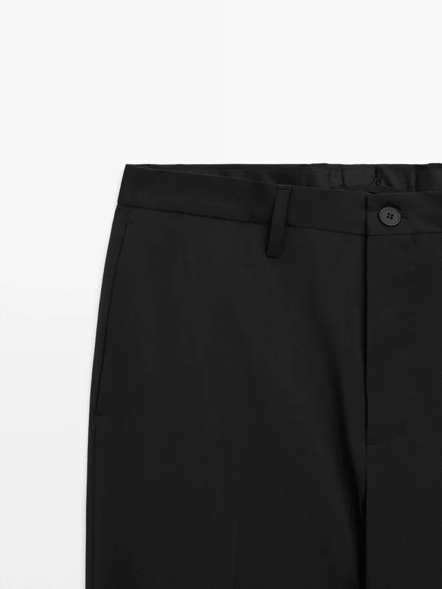 Enfärgade kostymbyxor i ull Enfärgade kostymbyxor i ull