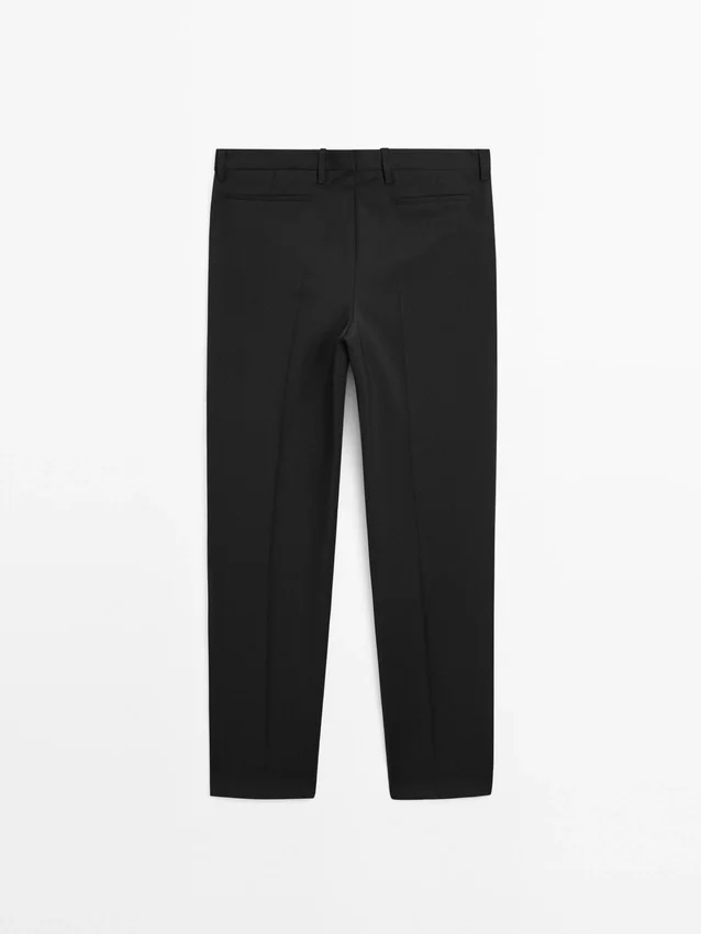 Enfärgade kostymbyxor i ull Enfärgade kostymbyxor i ull