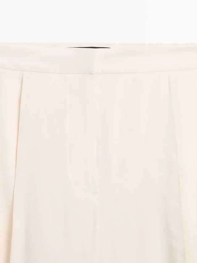 Flödande byxor med barrel-passform Flödande byxor med barrel-passform