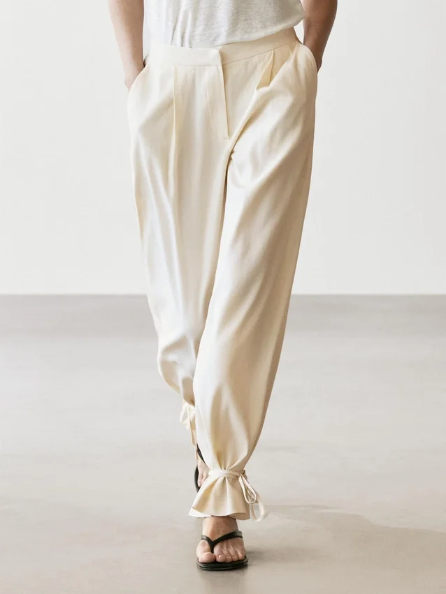 Flödande byxor med barrel-passform Flödande byxor med barrel-passform