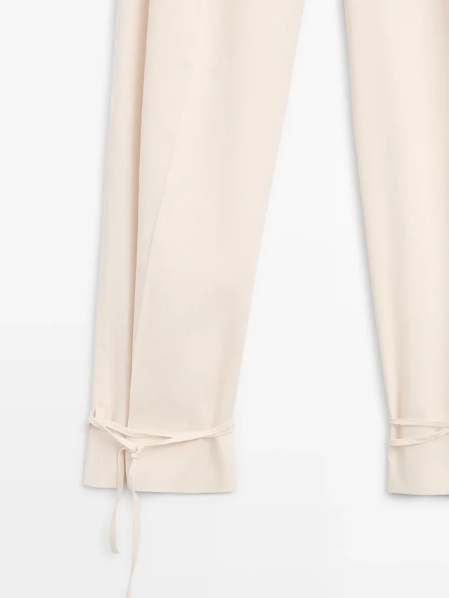 Flödande byxor med barrel-passform Flödande byxor med barrel-passform