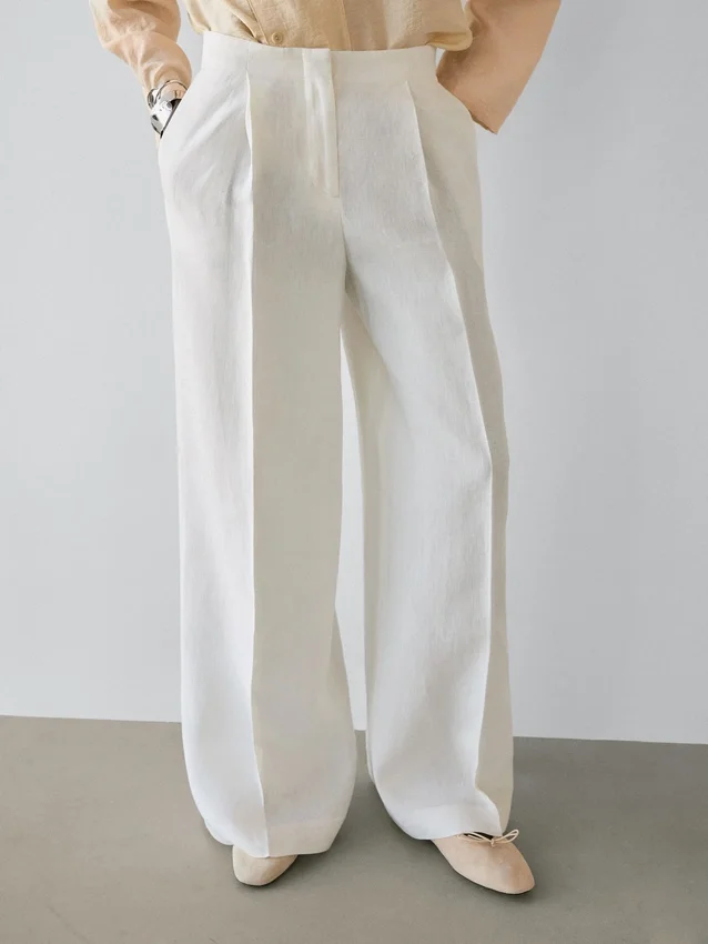 Flödande kostymbyxor i linne Flödande kostymbyxor i linne