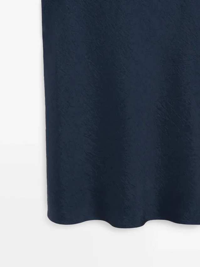 Flödande midiklänning Flödande midiklänning