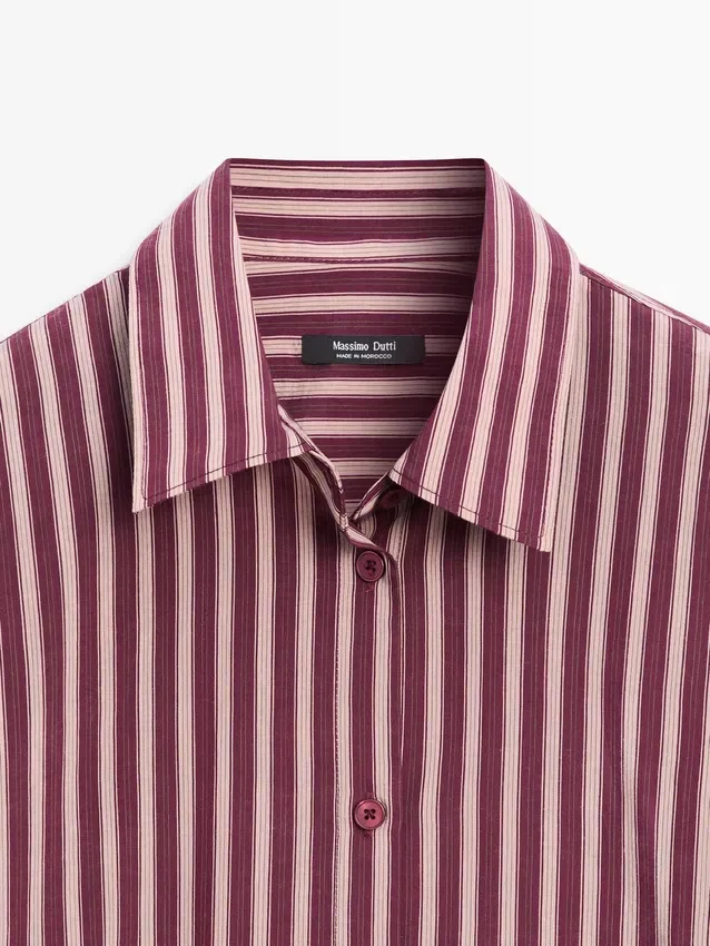 Flödande skjorta med randiga detaljer Flödande skjorta med randiga detaljer