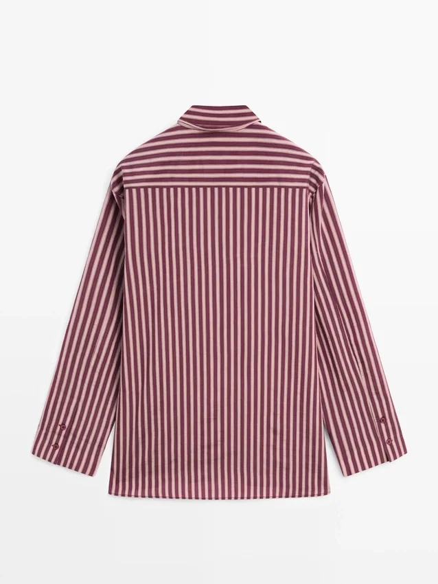 Flödande skjorta med randiga detaljer Flödande skjorta med randiga detaljer