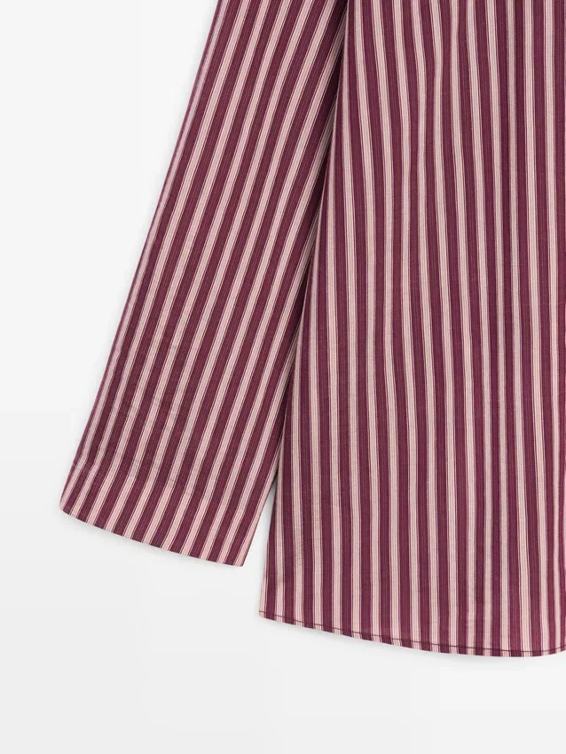 Flödande skjorta med randiga detaljer Flödande skjorta med randiga detaljer