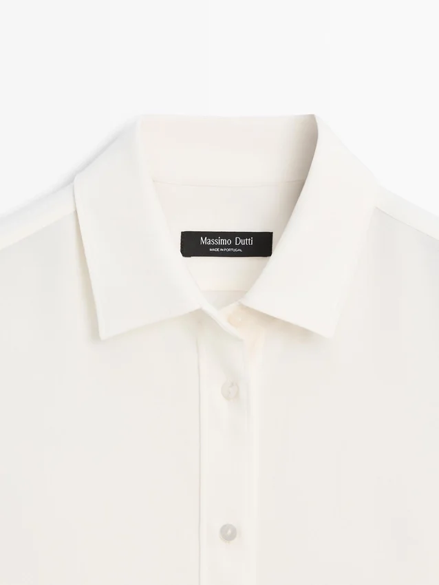 Flödande skjorta med skjortkrage Flödande skjorta med skjortkrage