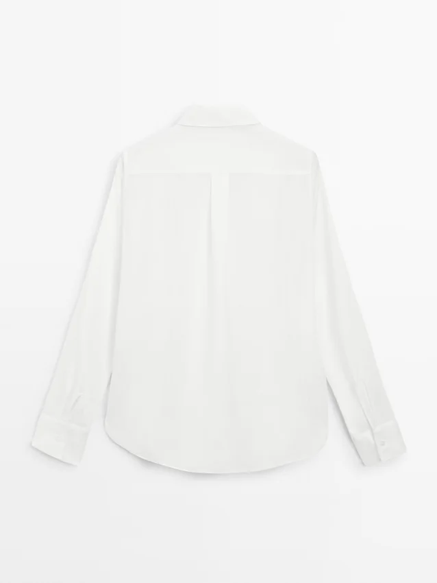 Flödande skjorta med skjortkrage Flödande skjorta med skjortkrage