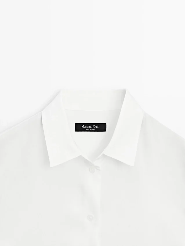 Flödande skjorta med skjortkrage Flödande skjorta med skjortkrage