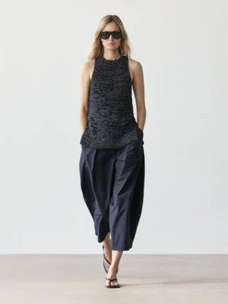 Fleckad stickad halterneck-top