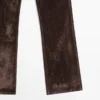 Högmidjade flockade bootcut-jeans