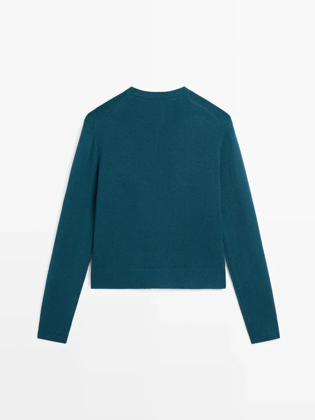 Kofta i ullstickat tyg med täckta knappar Kofta i ullstickat tyg med täckta knappar