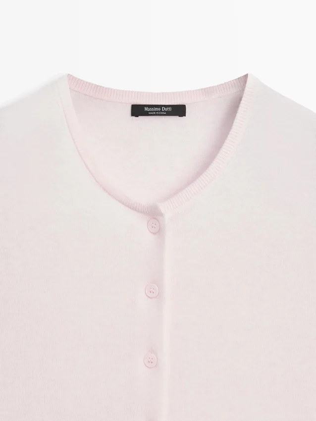 Kortärmad stickad kofta Kortärmad stickad kofta