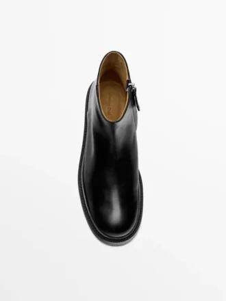 Läderankelstövlar med foder i mocka