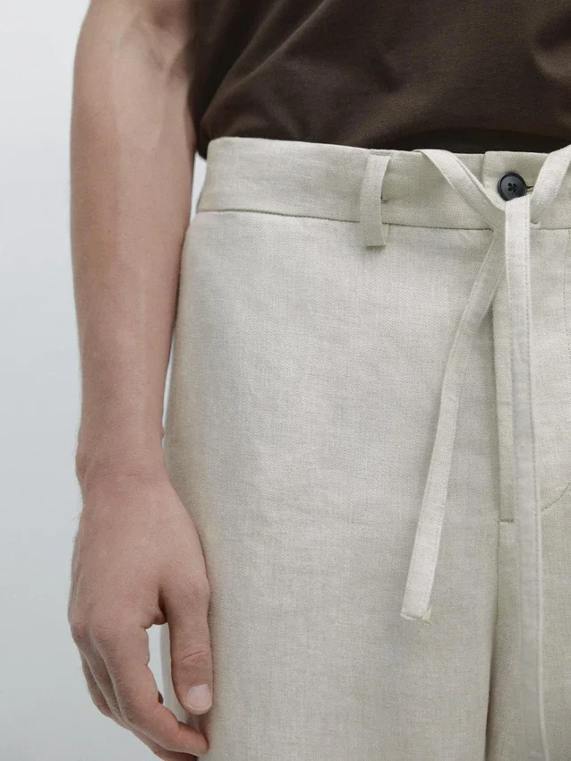 Lätta linnebyxor med fiskbensmönster Lätta linnebyxor med fiskbensmönster