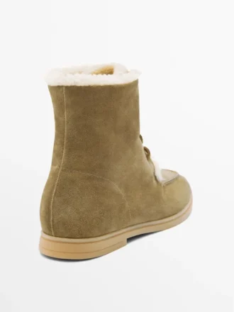 Platta ankelstövlar i spaltat läder med foder