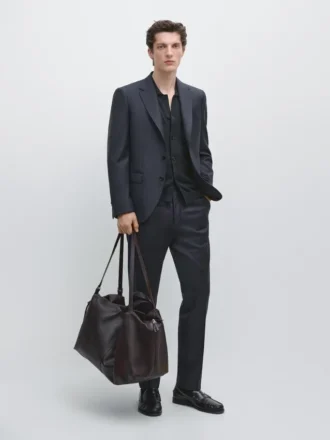 Randiga kostymbyxor i sval ull