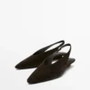 Slingback-skor i spaltat mocka