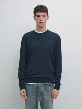 Stickad tröja i bomull och ull med rund hals