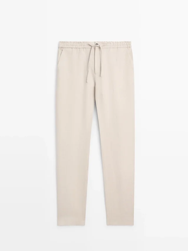 Total Look-byxor i linne med detalj i midjan Total Look-byxor i linne med detalj i midjan