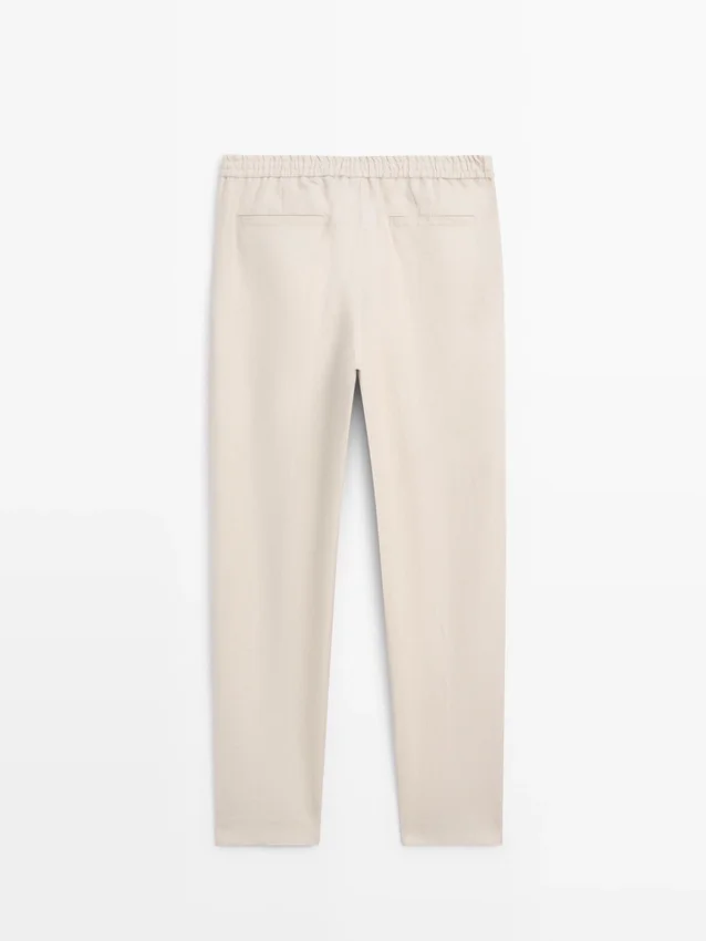 Total Look-byxor i linne med detalj i midjan Total Look-byxor i linne med detalj i midjan