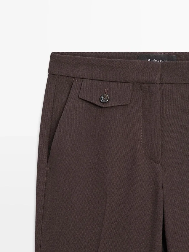 Utställda byxor med ficka Utställda byxor med ficka