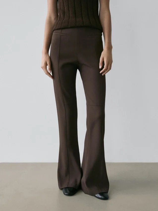 Utställda byxor med ficka Utställda byxor med ficka