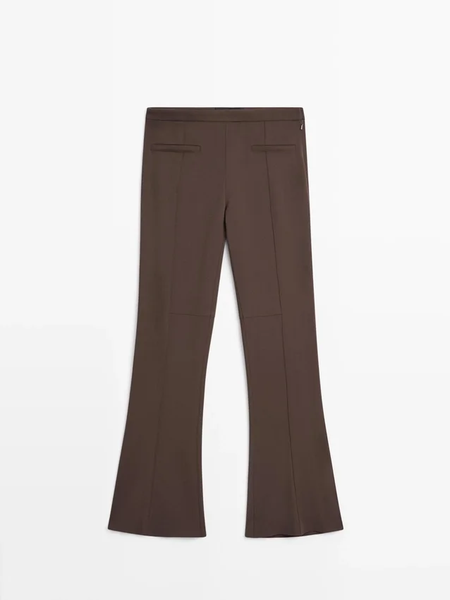 Utställda byxor med ficka Utställda byxor med ficka