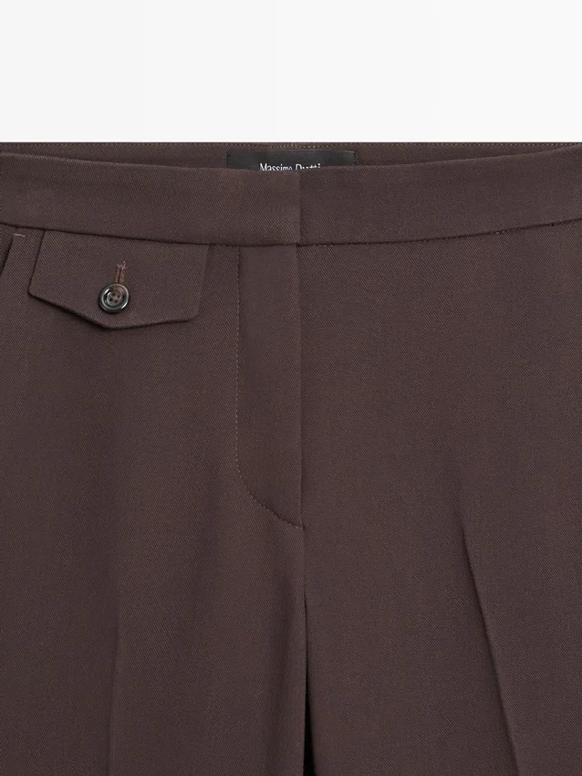 Utställda byxor med ficka Utställda byxor med ficka