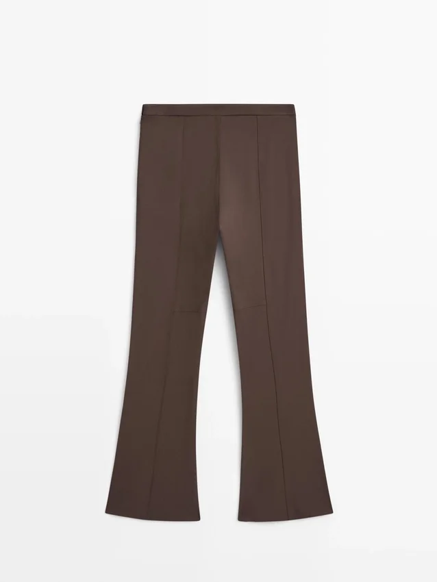 Utställda byxor med ficka Utställda byxor med ficka