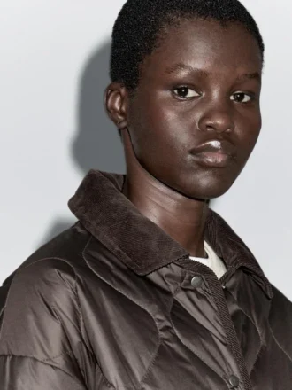 Vattenavvisande pufferjacka med detaljer i corduroy