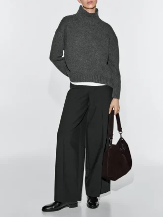 Väska i spaltat mocka med öljetter